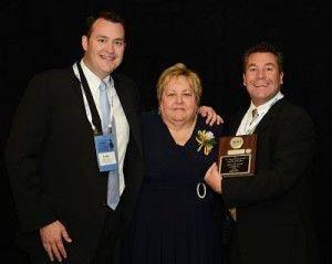 Ryan Ambs (left) and Andrew Ambs (right) accepting award from Sharon Campell ATSI president_opt