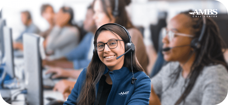 ambs call centers answering service agent sitting in front of stacked call center operations room